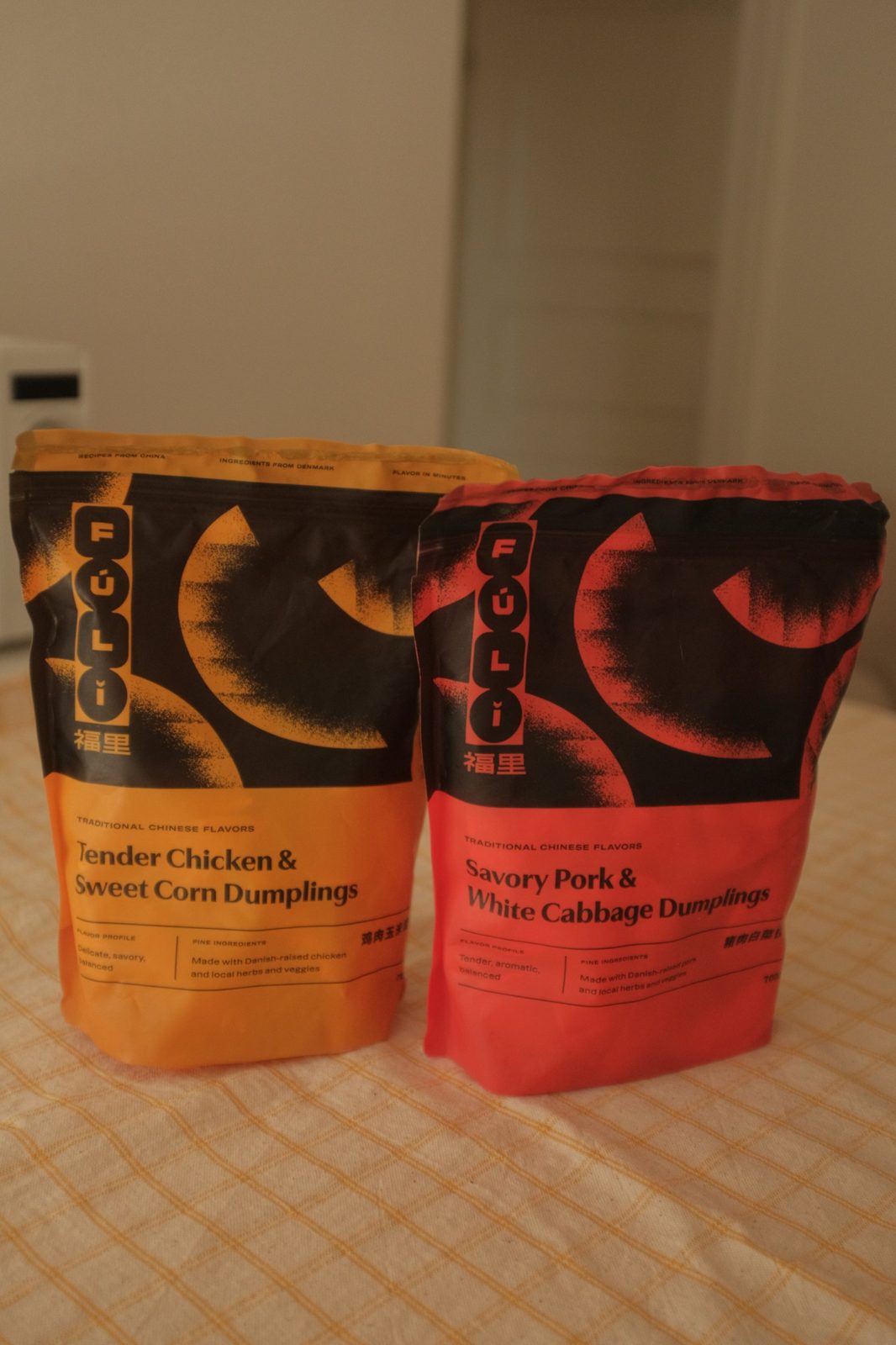 Two Fuli dumpling bags, chicken and pork